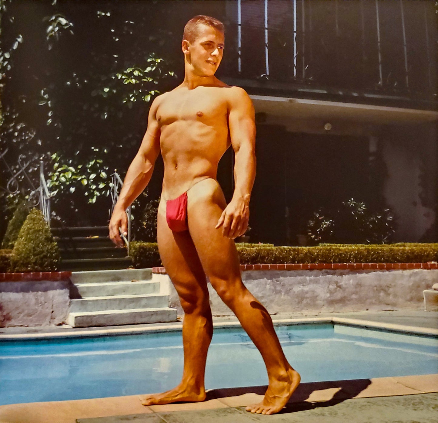 {{ product_title }} Fine Art Print | {{ product_vendor }} Jakero77 Bruce of LA - Phil Knight in Loin Cloth by Pool (1960s) Fine Art Print Art Print Jakero77