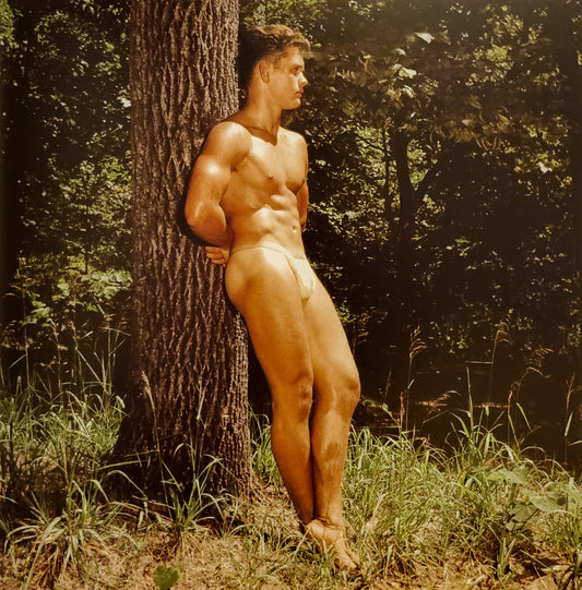 {{ product_title }} Fine Art Print | {{ product_vendor }} Jakero77 Bruce Bellas of LA - Lee Brewer Semi Nude Posing Strap Lean Against Tree (1960s) Fine Art Print Art Print  Jakero77