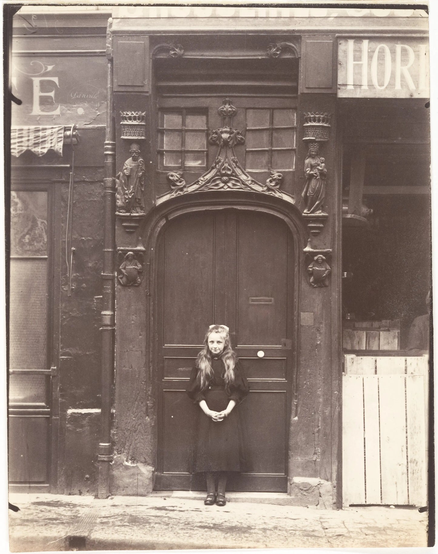{{ product_title }} Fine Art Print | {{ product_vendor }} Jakero77 Eugene Atget - Young Girl Infront of Door Rouen rue Eau-de Robac Paris France (1908) Fine Art Print Art Print  Jakero77
