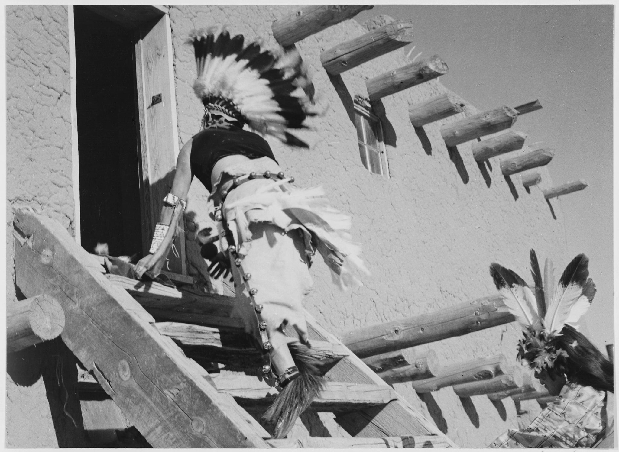 Ansel Adams - Two Indians in Headdress Ascend Stairs (1942) - 17" x 22" Art Print