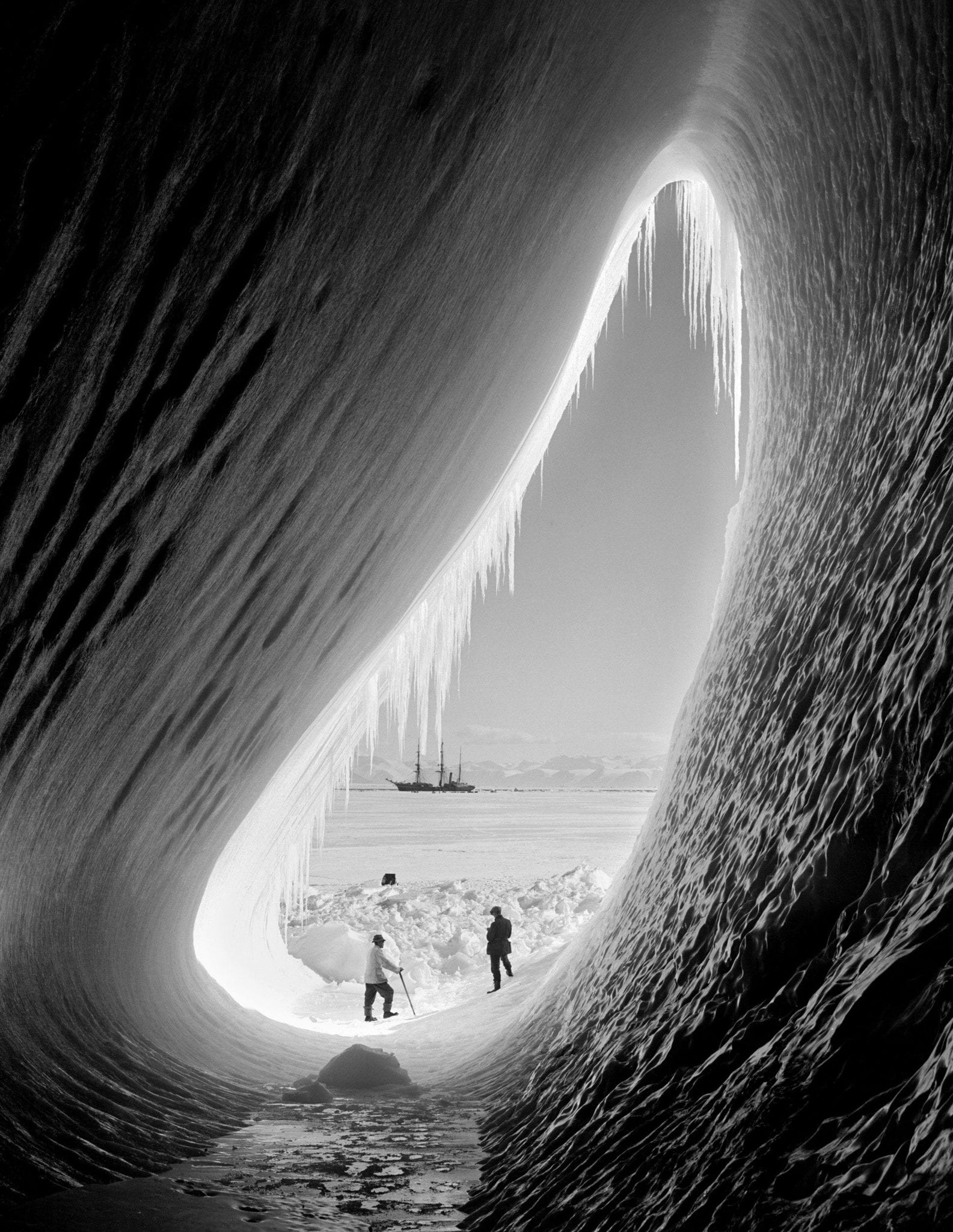 Herbert Ponting - Ice Grotto with Ship Far Off Antarctica (1910) - 17"x22" Print